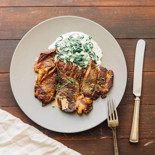 Steakhouse Classics: Steak with Peppercorn Sauce and Creamed Spinach - casa de sante